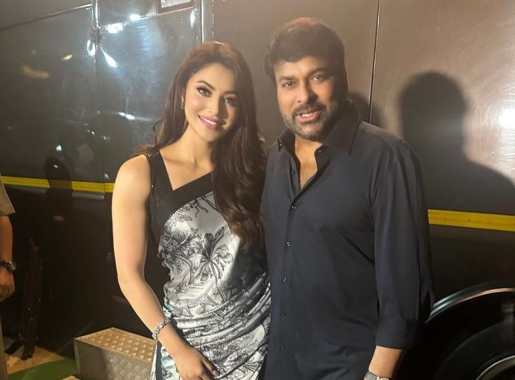 Chiranjeevi happily flirts with Urvashi Rautela at the Press meet of Waltair Veerayya in the mega 350cr film starring Ravi Teja